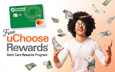 young man, with dollar bills falling around him. A GSB debit card and uChoose Rewards logo next to him.