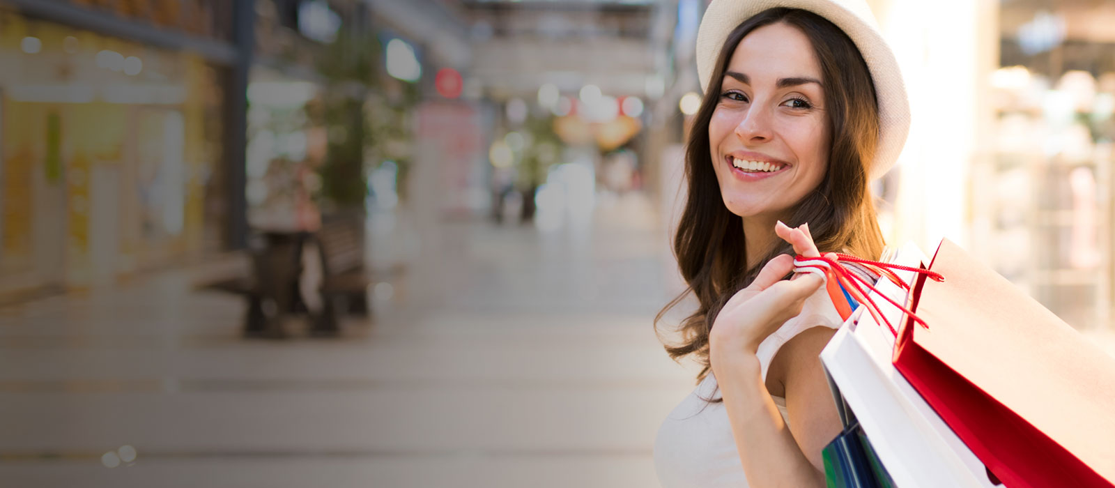 A smiling woman shopping