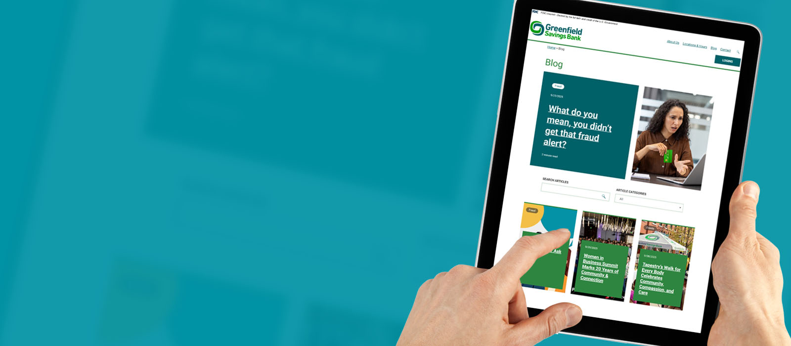 closeup of a man's hands holding an iPad looking at our blog page