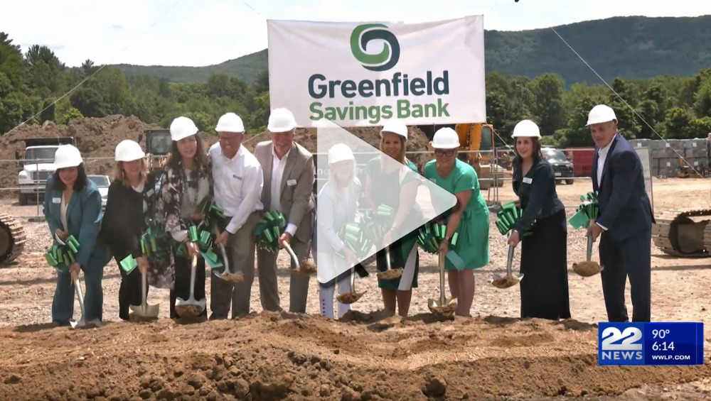 screenshot from a news video of GSB team members taking part in groundbreaking ceremonies in Easthampton