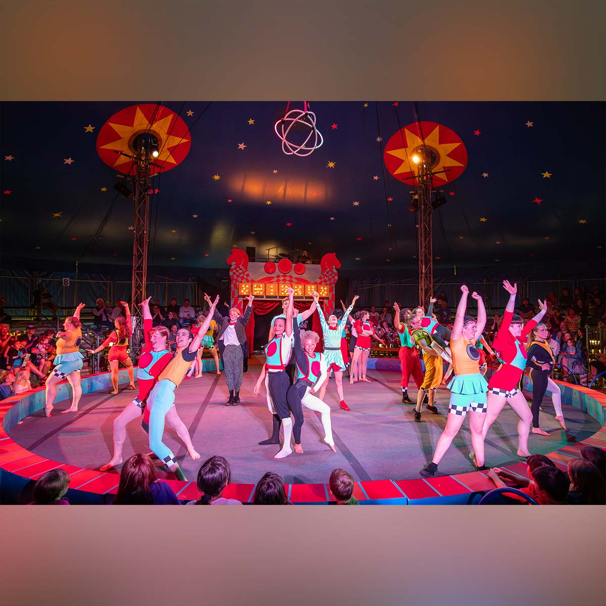photo of Circus Smirkus performers inside the tent's center ring