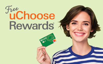 a woman holding her debit card for free uChoose Rewards