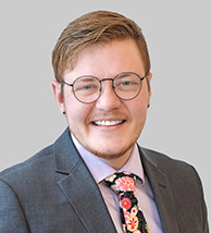 photo portrait of Briggs Doxzen