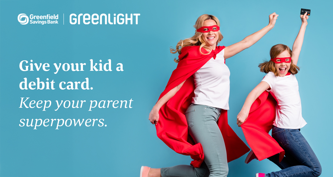 This image, promoting Greenlight, features an adult and a child dressed as masked superheroes wearing red caps. The text reads "Give your kids a debit card. Keep your parent super powers."
