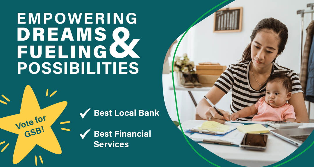 This is a header image to promote voting for GSB for Best in the Pioneer Valley. It has a teal background, and the text reads: Empower Dreams & Fueling Possibilities. Vote for GSB! Best Local Bank & Best Financial Services. The image is a business woman holder her baby while she works.