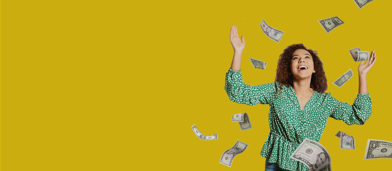 young woman with dollar bills falling around her.