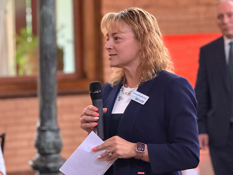 Cassie Morrey speaking at a Buy in July kickoff event