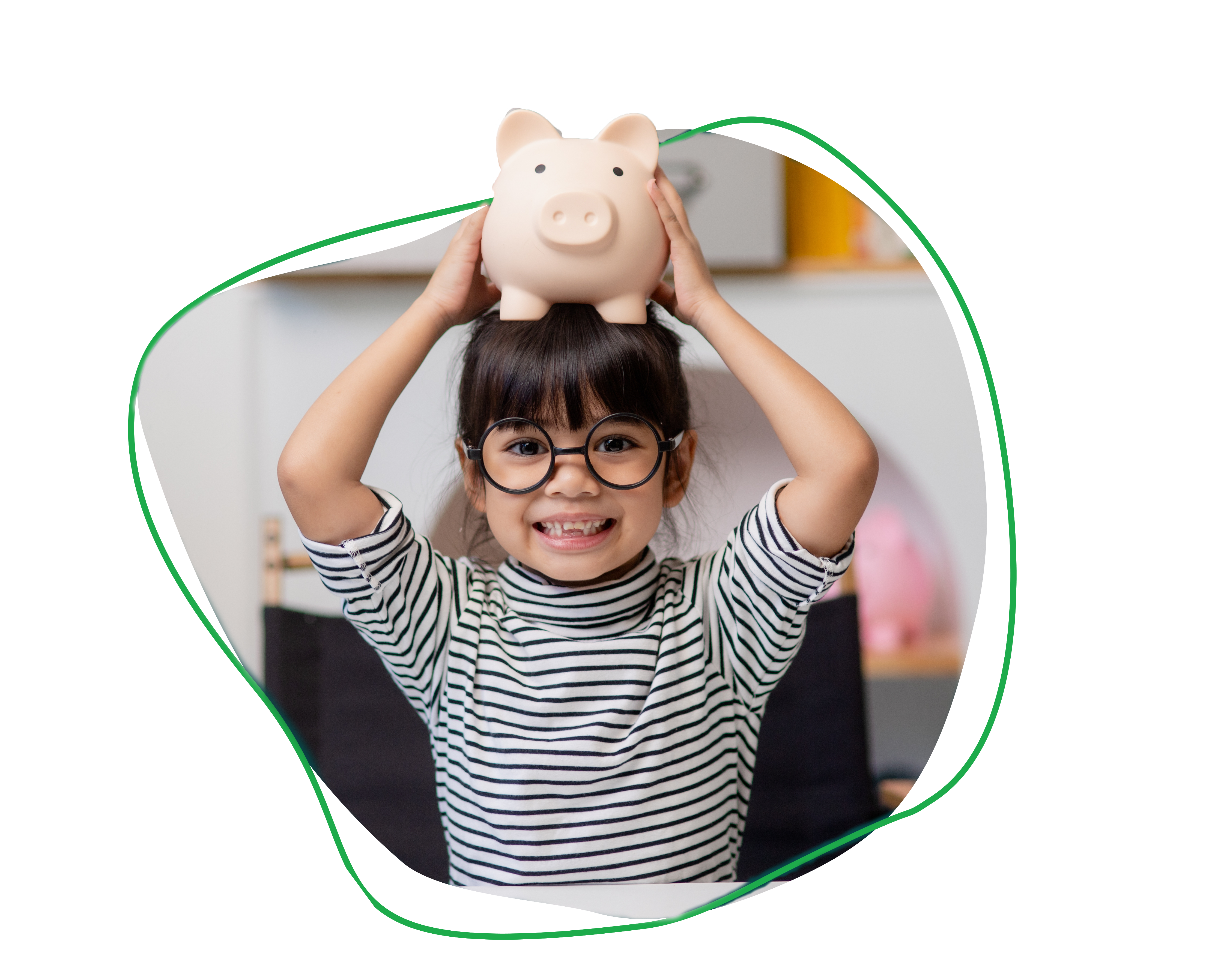 Child holding a piggy bank above their head, representing saving money and building financial habits from a young age.