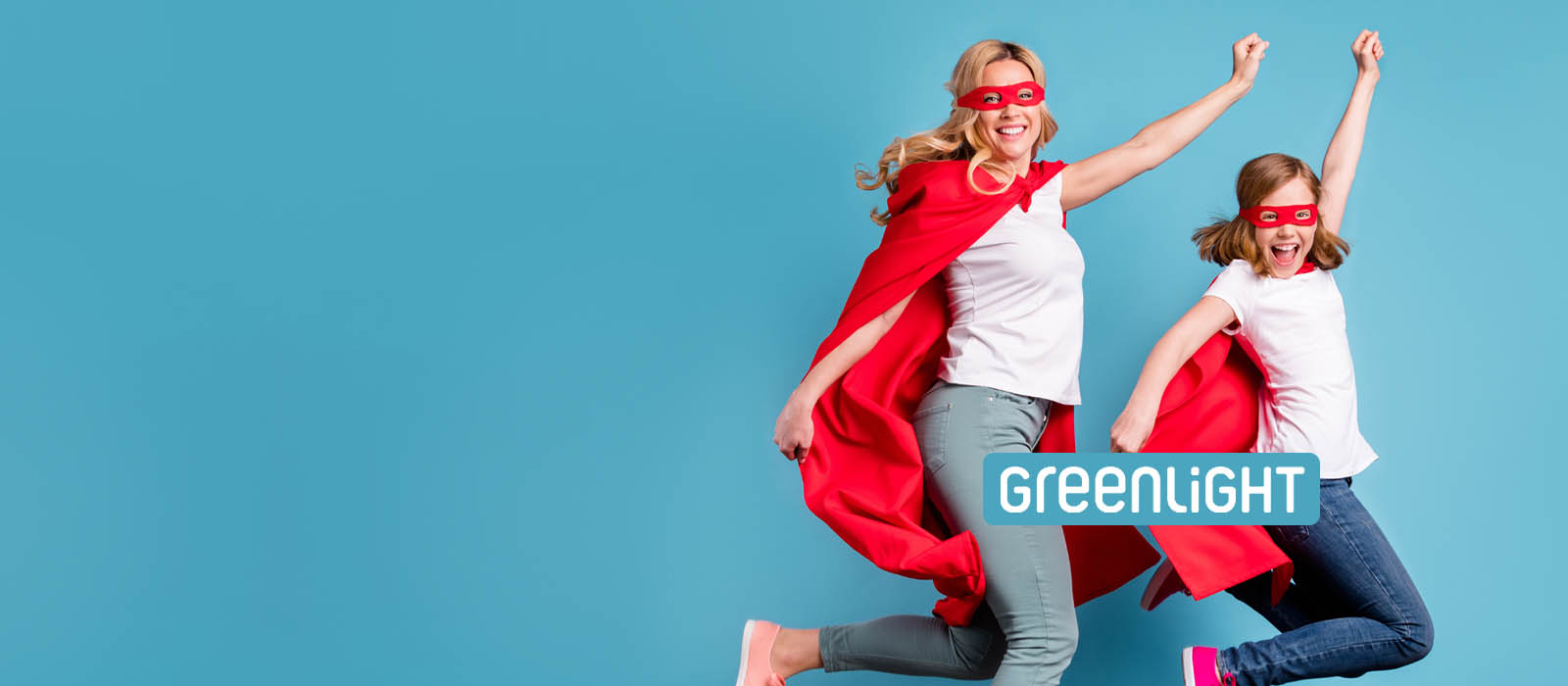 greenlight logo with photo of mom and daughter wearing superhero costumes
